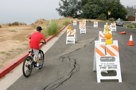 The southbound lane of Asilomar Boulevard has dropped almost a foot, making the road impassable and leading to predictions of a possible landslide that could be triggered by an earthquake or an usually high ground-water level rise.